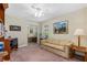 Spare bedroom offers flexible space with a comfortable sofa and plenty of room at 105 Riviera Estates Blvd, Ormond Beach, FL 32174