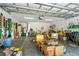 Spacious garage providing ample room for parking, storage, and various household projects at 105 Riviera Estates Blvd, Ormond Beach, FL 32174