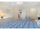 Comfortable primary bedroom with light walls, ensuite bathroom, and walk-in closet access at 105 Riviera Estates Blvd, Ormond Beach, FL 32174