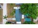 Overhead shot of a home featuring a new metal roof, above ground pool, and a large recreational vehicle at 1135 5Th St, Orange City, FL 32763