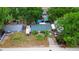 Charming single Gathering home featuring mature trees, a detached shed and an above ground pool at 1135 5Th St, Orange City, FL 32763