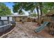 Spacious backyard with a pool, play structure, offering recreational space and activities at 1135 5Th St, Orange City, FL 32763
