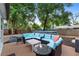 Spacious backyard with above-ground pool, hot tub, and comfortable seating area at 1135 5Th St, Orange City, FL 32763