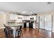Bright kitchen featuring white cabinetry, a breakfast bar, and modern appliances, ready for culinary adventures at 1135 5Th St, Orange City, FL 32763