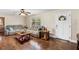 Comfortable and inviting living room with ample seating and a welcoming atmosphere for relaxation at 1135 5Th St, Orange City, FL 32763