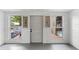 Enclosed patio offers abundant natural light with views of the backyard at 1135 5Th St, Orange City, FL 32763