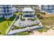 Relaxing backyard deck featuring multiple seating areas, well maintained landscaping, and partial ocean views at 1167 Ocean Shore Blvd # 110, Ormond Beach, FL 32176