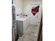 Laundry room with a washer, dryer, and water heater at 1228 S Parsons Ave, Deland, FL 32720
