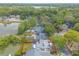 Aerial view of a beautiful lakeside home, with lush landscaping and a tranquil setting outlined in red at 1229 Saddleback Ridge Rd, Apopka, FL 32703