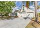 Charming two-story home with a two-car garage, a well-manicured lawn, and large palm tree at 1229 Saddleback Ridge Rd, Apopka, FL 32703