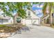 Charming two-story home with a two-car garage and a well-maintained front yard at 1229 Saddleback Ridge Rd, Apopka, FL 32703