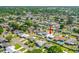 Aerial shot shows the property nestled in a quiet neighborhood with lush greenery at 1317 Suwanee Rd, Daytona Beach, FL 32114