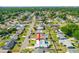 Aerial view of a neighborhood with a single-Gathering home featuring a swimming pool and fenced-in yard at 1317 Suwanee Rd, Daytona Beach, FL 32114