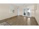 Bright bonus room featuring tile floors and sliding doors leading to the outdoors at 1317 Suwanee Rd, Daytona Beach, FL 32114