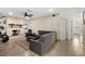 Spacious living room with tile floors and a decorative fireplace at 1317 Suwanee Rd, Daytona Beach, FL 32114