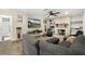 Another view of the spacious living room with decorative fireplace and tile floors at 1317 Suwanee Rd, Daytona Beach, FL 32114