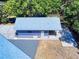 Aerial view of detached garage, highlighting its layout and surrounding landscaping at 1371 Merrifield Ct, Deltona, FL 32725