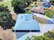 Aerial view of the home featuring roof, backyard, and surrounding neighborhood at 1371 Merrifield Ct, Deltona, FL 32725