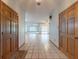 Inviting entryway with tiled flooring, two doors, and views into the living spaces at 1371 Merrifield Ct, Deltona, FL 32725