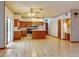 Open-concept kitchen and dining area with stainless steel appliances, and a breakfast bar at 1371 Merrifield Ct, Deltona, FL 32725