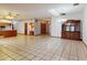 An open layout featuring tile floors and an antique china cabinet for storage and display at 1371 Merrifield Ct, Deltona, FL 32725