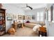 Cozy bedroom with comfortable daybed, writing desk, and natural light at 1374 Red Clover Ln, Deland, FL 32724