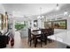 Open-concept living area with tile floors, and large sliding glass doors leading to a private lanai at 1374 Red Clover Ln, Deland, FL 32724