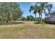 Expansive backyard with mature trees and lush landscaping at 1420 Shady Meadow Ln, Deland, FL 32724