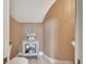 Stylish powder room with a decorative cabinet, curved wall and unique design at 1420 Shady Meadow Ln, Deland, FL 32724