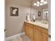 Well-lit bathroom vanity featuring modern fixtures, a mirror, and ample counter space at 1420 Shady Meadow Ln, Deland, FL 32724