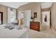 Tastefully decorated bedroom with ensuite bathroom and carpet at 1420 Shady Meadow Ln, Deland, FL 32724
