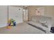 Well-lit bedroom features neutral colors, plush carpeting, and ample closet space at 1420 Shady Meadow Ln, Deland, FL 32724