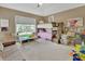 Cozy ' bedroom with bunk beds, a window, and plenty of space for playing and reading at 1420 Shady Meadow Ln, Deland, FL 32724