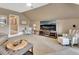 Spacious bonus room features a TV, seating, and neutral colors at 1420 Shady Meadow Ln, Deland, FL 32724