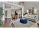 Spacious living room features hardwood floors, stylish furniture, and a dramatic overlook at 1420 Shady Meadow Ln, Deland, FL 32724