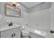 This bathroom features a shower and tub combination, toilet, and a single vanity at 150 Reef Rd, South Daytona, FL 32119