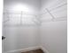 Walk-in closet with wire shelving and neutral wall-to-wall carpeting at 1598 Montgomery Ave, Daytona Beach, FL 32117