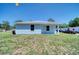 Charming single-story home with fresh siding, manicured lawn, and lots of charm at 1598 Montgomery Ave, Daytona Beach, FL 32117