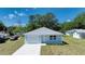 Inviting home showcases fresh siding, a single-car garage, and a neatly manicured lawn at 1598 Montgomery Ave, Daytona Beach, FL 32117