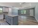 Open concept kitchen with an island, ceiling fan, recessed lights and stainless steel appliances at 1598 Montgomery Ave, Daytona Beach, FL 32117