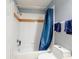 Bright bathroom featuring a tub with shower, vanity, and neutral-toned decor at 161 Blue Heron Dr # C, Daytona Beach, FL 32119