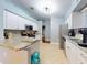 Well-equipped kitchen boasts stainless steel appliances, granite counters, and lots of storage space at 161 Blue Heron Dr # C, Daytona Beach, FL 32119