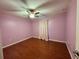 This bedroom offers hardwood floors, ceiling fan and great natural lighting at 1649 Courtland Blvd, Deltona, FL 32738
