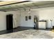 The spacious garage includes storage, utility sink, and access to the home's interior at 1649 Courtland Blvd, Deltona, FL 32738