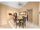 Cozy dining area with a breakfast table and chairs adjacent to the kitchen at 1731 Urbana Ave, Deltona, FL 32725