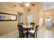 Inviting dining area with ceiling fan and views to the entryway at 1731 Urbana Ave, Deltona, FL 32725