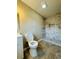 Modern bathroom with a tiled shower, new fixtures, and updated flooring, designed for comfort and style at 1808 Green Pl, Ormond Beach, FL 32174
