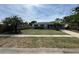 Charming home with a well-maintained front yard and mature landscaping at 1808 Green Pl, Ormond Beach, FL 32174