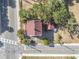 Aerial view of home featuring a well manicured lot and mature trees at 216 Earl St, Daytona Beach, FL 32118