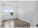 Bedroom with hard wood floors and plenty of natural light at 216 Earl St, Daytona Beach, FL 32118